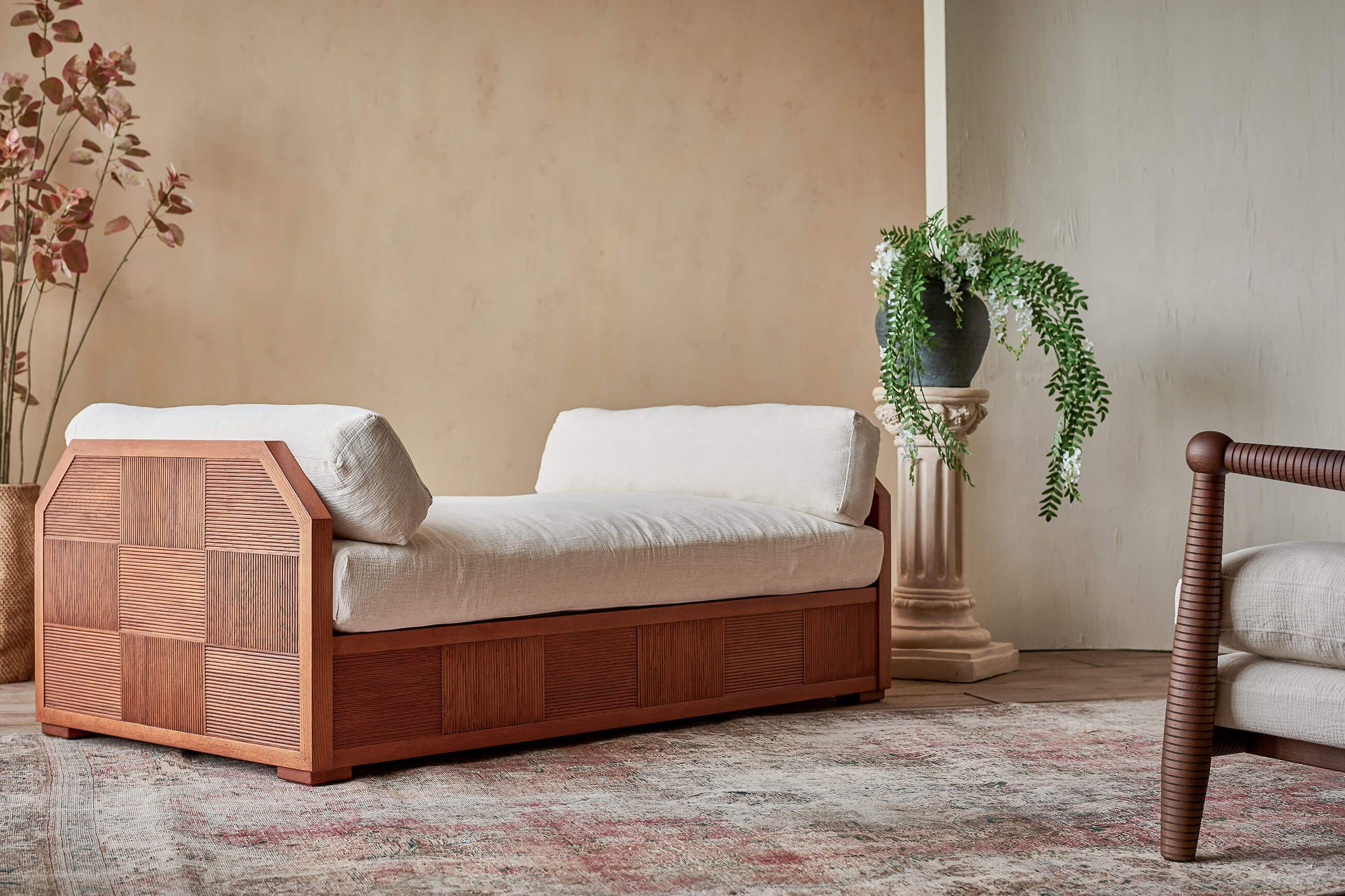 Daybed with mattress in a styled living room setting