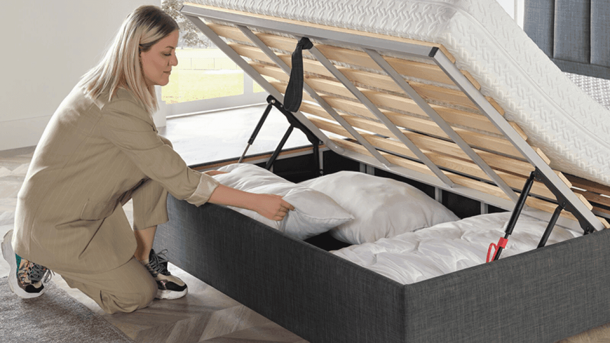 Box spring foundation supporting a mattress in a bedroom